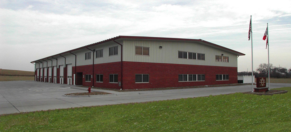 Fire Station Steel Building Kit with red and beige wall panels